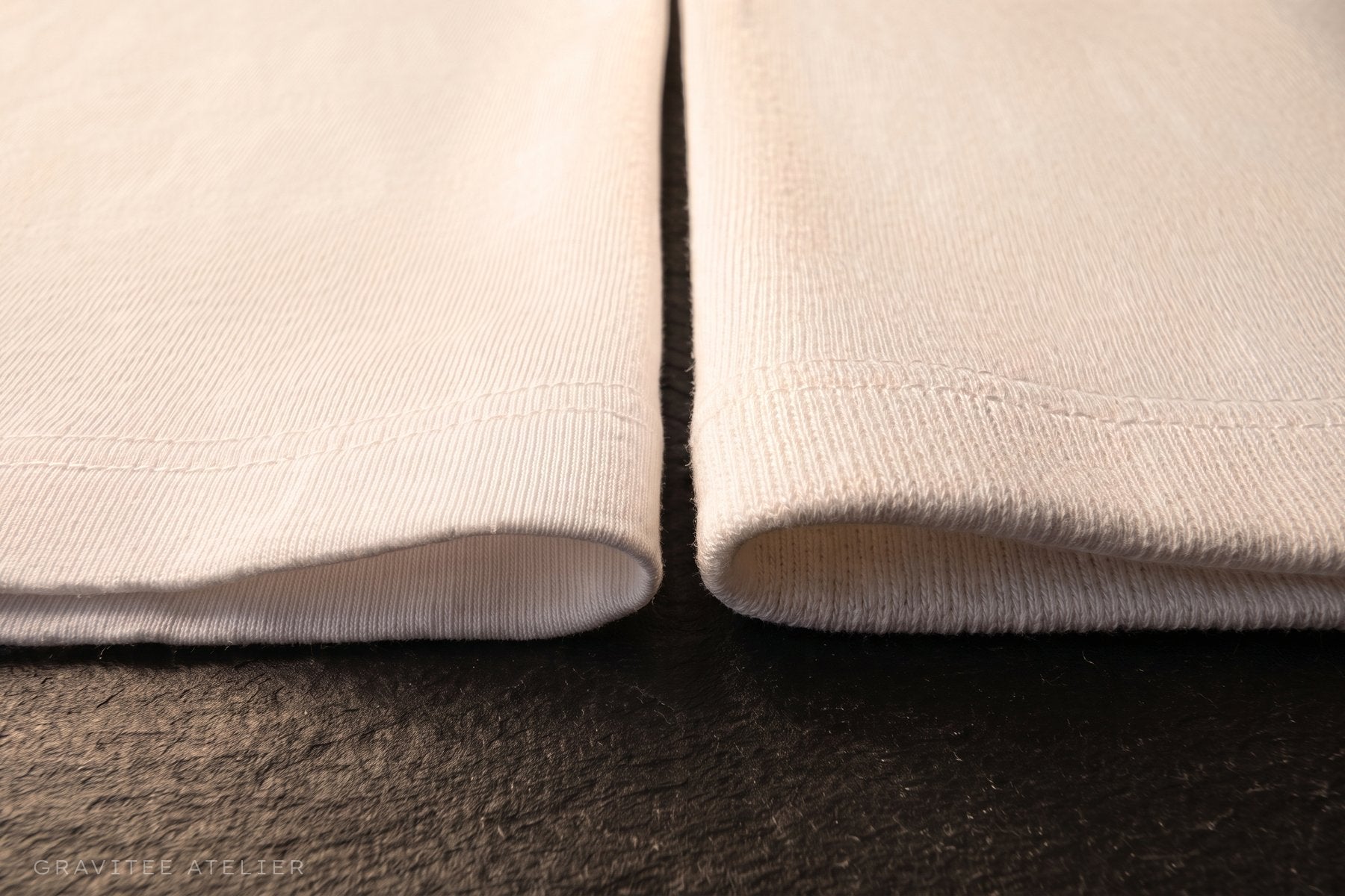 Two cotton t-shirt hems side by side: a lighter, finer jersey on the left and a heavier, fuller one on the right